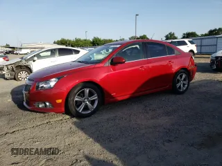 2014 Chevrolet Cruze 2LT with VIN 1G1PE5SBXE7419833, listed as a Copart auction lot 57303095 with 128,968 mi miles and Salvage title. Bid and sale history available at DreamBid. Image 1.