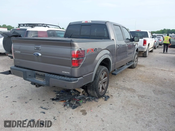 2014 Ford F-150 XL with VIN 1FTFW1EFXEKF21377, listed as a IAAI auction lot 42133053 with 99,924 mi miles and . Bid and sale history available at DreamBid. Image 4.