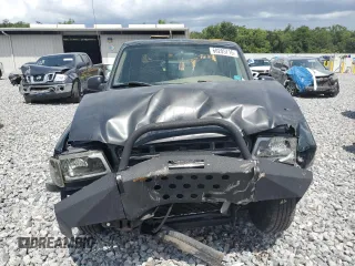 2002 Ford Ranger XLT Appearance with VIN 1FTYR44E42TA32828, listed as a Copart auction lot 60205715 with 290,846 mi miles and Salvage title. Bid and sale history available at DreamBid. Image 5.