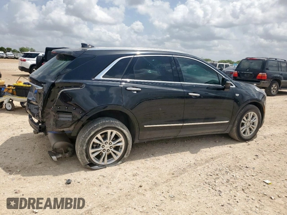 2021 Cadillac XT5 FWD Luxury with VIN 1GYKNAR42MZ120996, listed as a Copart auction lot 63314655 with 49,977 mi miles and Salvage title. Bid and sale history available at DreamBid. Image 3.