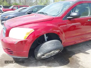 2007 Dodge Caliber SXT with VIN 1B3HB48B87D558516, listed as a IAAI auction lot 42004401 with 217,733 mi miles and . Bid and sale history available at DreamBid. Image 6.