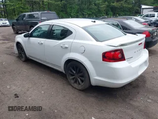 2014 Dodge Avenger SE with VIN 1C3CDZAB0EN148086, listed as a IAAI auction lot 42234364 with 200,650 mi miles and . Bid and sale history available at DreamBid. Image 3.