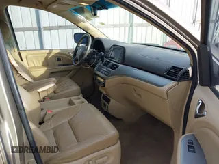 2010 Honda Odyssey Touring with VIN 5FNRL3H9XAB094779, listed as a IAAI auction lot 40412812 with 145,533 mi miles. Bid and sale history available at carsss.com. Image 5.