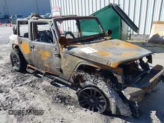 2014 Jeep Wrangler Unlimited Sport with VIN 1C4BJWDGXEL149702, listed as a IAAI auction lot 41621168 with Not Provided miles and . Bid and sale history available at DreamBid. Image 1.