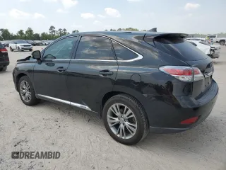 2014 Lexus RX 450h with VIN JTJZB1BA1E2413678, listed as a Copart auction lot 68524544 with 104,784 mi miles and Salvage title. Bid and sale history available at DreamBid. Image 2.