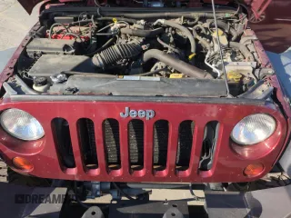 2010 Jeep Wrangler Unlimited Rubicon with VIN 1J4BA6H13AL140902, listed as a Copart auction lot 54335455 with 118,423 mi miles and Clean title. Bid and sale history available at DreamBid. Image 12.