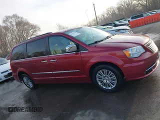 2015 Chrysler Town & Country Touring-L with VIN 2C4RC1CG7FR674321, listed as a IAAI auction lot 41750796 with 165,179 mi miles. Bid and sale history available at carsss.com. Image 13.