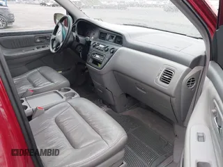 2003 Honda Odyssey EX-L with VIN 5FNRL18993B009180, listed as a IAAI auction lot 42224572 with 187,781 mi miles and . Bid and sale history available at DreamBid. Image 5.