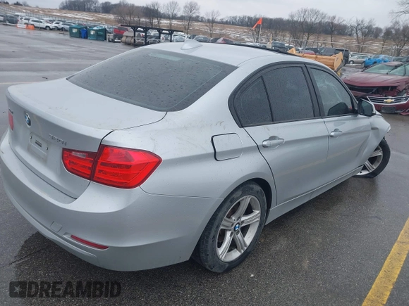 2015 BMW 3 Series 320i xDrive with VIN WBA3C3G57FNS74652, listed as a IAAI auction lot 41723695 with 146,919 mi miles and . Bid and sale history available at DreamBid. Image 4.