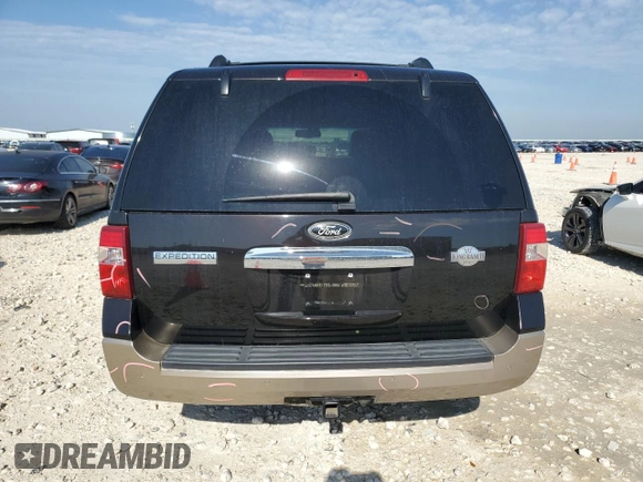 2014 Ford Expedition King Ranch z VIN 1FMJU1J50EEF14834, wystawiony jako Copart lot #56330715 z przebiegiem 159 420 mil mil oraz Szkoda całkowita • Salvage title. Historia ofert i sprzedaży dostępna na DreamBid. Obrazek 6.