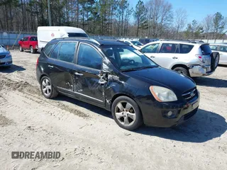 2007 Kia Rondo LX with VIN KNAFG526377050135, listed as a IAAI auction lot 41633668 with 223,714 mi miles. Bid and sale history available at carsss.com. Image 1.