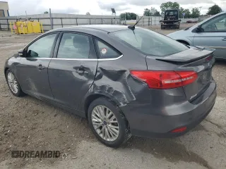 2015 Ford Focus Titanium с VIN 1FADP3J21FL254702, выставлен на аукционе Copart как лот 59872395 с пробегом 93 195 миль миль и Списание • Salvage title. История ставок и продаж доступна на DreamBid. Изображение 2.
