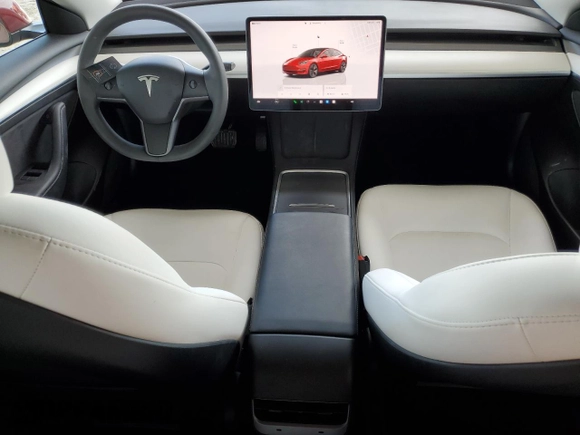 2022 Tesla Model 3 with VIN 5YJ3E1EA0NF329568, listed as a Copart auction lot 52594205 with 27,446 mi miles and Non Repairable. Bid and sale history available at carsss.com. Image 8.