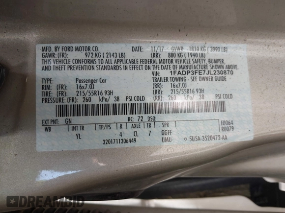 2018 Ford Focus SE with VIN 1FADP3FE7JL230870, listed as a IAAI auction lot 42021541 with 84,000 mi miles. Bid and sale history available at carsss.com. Image 9.