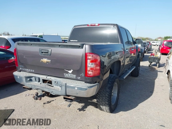 2010 Chevrolet Silverado 1500 LT with VIN 3GCRCSE06AG197630, listed as a IAAI auction lot 41826507 with 135,903 mi miles and . Bid and sale history available at DreamBid. Image 4.
