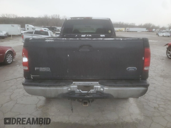 1999 Ford F-350 XL with VIN 1FTSW31F7XEE21691, listed as a Copart auction lot 86628534 with 294,887 mi miles and Salvage title. Bid and sale history available at DreamBid. Image 6.