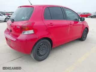 2009 Toyota Yaris with VIN JTDKT903295244022, listed as a IAAI auction lot 41615570 with 165,964 mi miles. Bid and sale history available at carsss.com. Image 4.