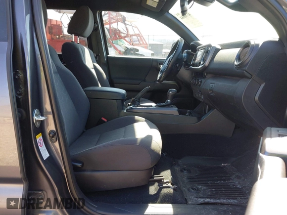 2018 Toyota Tacoma SR with VIN 5TFCZ5AN9JX123749, listed as a IAAI auction lot 41768884 with 42,852 mi miles and . Bid and sale history available at DreamBid. Image 5.