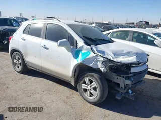 2019 Chevrolet Trax LT with VIN 3GNCJLSB0KL150987, listed as a IAAI auction lot 41408466 with 113,451 mi miles and . Bid and sale history available at carsss.com. Image 1.