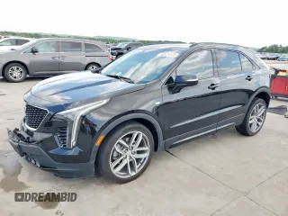 2020 Cadillac XT4 FWD Sport z VIN 1GYFZER47LF146488, wystawiony jako Copart lot #53174175 z przebiegiem 66 820 mil mil oraz Szkoda całkowita • Salvage title. Historia ofert i sprzedaży dostępna na DreamBid. Obrazek 1.