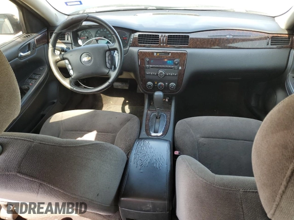 2014 Chevrolet Impala LS z VIN 2G1WA5E39E1162205, wystawiony jako Copart lot #56305635 z przebiegiem 178 610 mil mil oraz Szkoda całkowita • Salvage title. Historia ofert i sprzedaży dostępna na DreamBid. Obrazek 8.