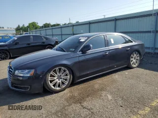 2015 Audi A8 4.0T z VIN WAU32AFDXFN035368, wystawiony jako Copart lot #62078435 z przebiegiem Nie podano mil oraz Czysty tytuł • Clean title. Historia ofert i sprzedaży dostępna na DreamBid. Obrazek 1.