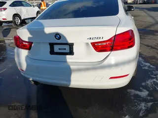 2014 BMW 4 Series 428i with VIN WBA3N7C50EF718812, listed as a IAAI auction lot 41349128 with 67,581 mi miles and . Bid and sale history available at carsss.com. Image 16.