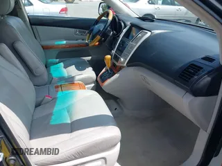 2007 Lexus RX 400h with VIN JTJGW31U372001817, listed as a IAAI auction lot 42047143 with 155,767 mi miles and . Bid and sale history available at DreamBid. Image 5.