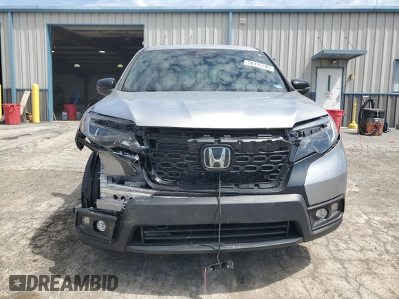 2019 Honda Passport EX-L z VIN 5FNYF8H5XKB019773, wystawiony jako Copart lot #56115105 z przebiegiem 92 885 mil mil oraz Szkoda całkowita • Salvage title. Historia ofert i sprzedaży dostępna na DreamBid. Obrazek 5.