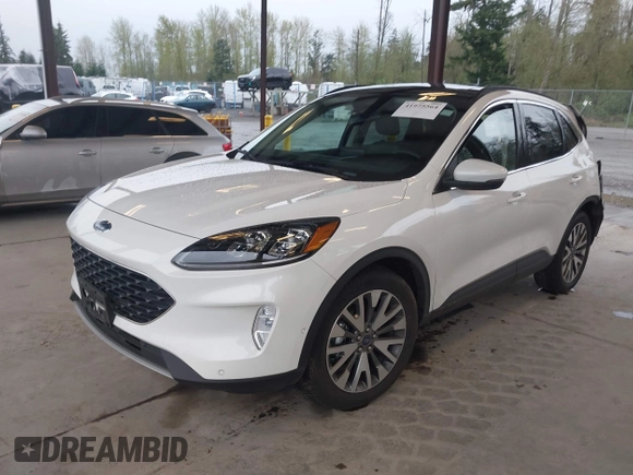 2020 Ford Escape Titanium Hybrid z VIN 1FMCU9DZ8LUA58350, wystawiony jako IAAI lot #41975564 z przebiegiem 38 387 mil mil oraz . Historia ofert i sprzedaży dostępna na DreamBid. Obrazek 17.