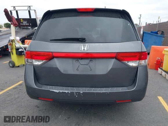 2014 Honda Odyssey Touring with VIN 5FNRL5H97EB114634, listed as a IAAI auction lot 42105220 with Not Provided miles and . Bid and sale history available at carsss.com. Image 15.