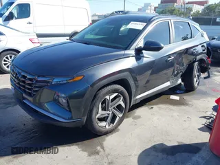 2022 Hyundai Tucson SEL with VIN 5NMJCCAEXNH061242, listed as a IAAI auction lot 41866145 with 63,501 mi miles and . Bid and sale history available at carsss.com. Image 16.