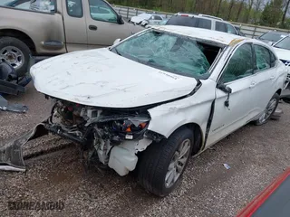2016 Chevrolet Impala LT with VIN 2G1115S33G9126643, listed as a IAAI auction lot 41930464 with 149,829 mi miles. Bid and sale history available at carsss.com. Image 2.