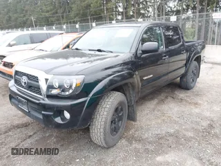 2011 Toyota Tacoma with VIN 3TMLU4EN1BM070300, listed as a IAAI auction lot 41710119 with 199,099 mi miles and . Bid and sale history available at DreamBid. Image 2.