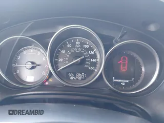 2015 Mazda CX-5 Grand Touring with VIN JM3KE4DY7F0481883, listed as a IAAI auction lot 42091709 with 184,248 mi miles and . Bid and sale history available at DreamBid. Image 7.