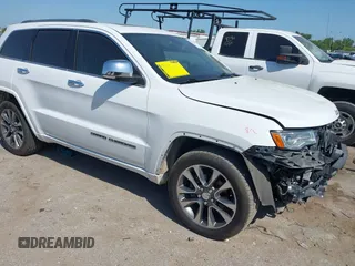 2017 Jeep Grand Cherokee Overland z VIN 1C4RJFCG6HC659209, wystawiony jako IAAI lot #41992648 z przebiegiem 108 527 mil mil oraz . Historia ofert i sprzedaży dostępna na DreamBid. Obrazek 1.