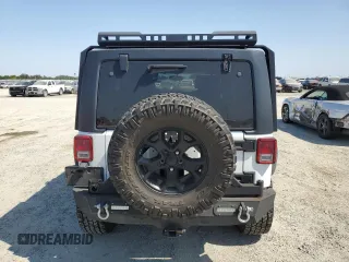 2014 Jeep Wrangler Unlimited Rubicon with VIN 1C4BJWFG0EL201559, listed as a Copart auction lot 59580575 with 182,101 mi miles and Salvage title. Bid and sale history available at DreamBid. Image 6.