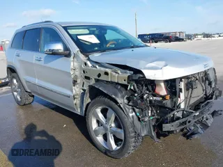2013 Jeep Grand Cherokee Overland with VIN 1C4RJECG9DC545886, listed as a IAAI auction lot 41998913 with 166,077 mi miles. Bid and sale history available at carsss.com. Image 1.