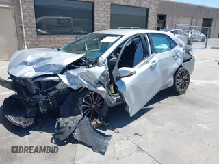 2016 Toyota Corolla L z VIN 5YFBURHE4GP410981, wystawiony jako IAAI lot #42293582 z przebiegiem 77 319 mil mil oraz . Historia ofert i sprzedaży dostępna na DreamBid. Obrazek 19.