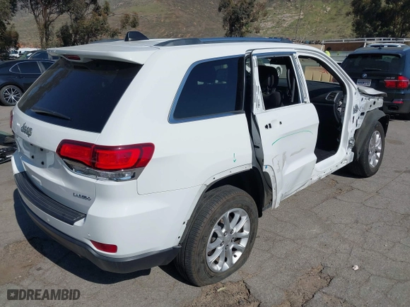 2021 Jeep Grand Cherokee Laredo X with VIN 1C4RJEAG3MC714500, listed as a IAAI auction lot 41637602 with 71,537 mi miles. Bid and sale history available at carsss.com. Image 4.