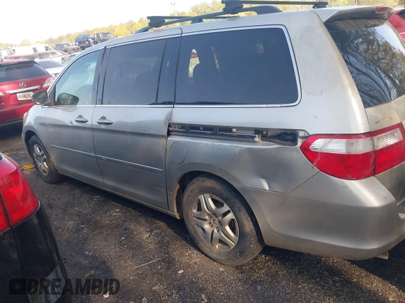2005 Honda Odyssey EX-L with VIN 5FNRL38635B415153, listed as a IAAI auction lot 41912526 with 211,445 mi miles. Bid and sale history available at carsss.com. Image 3.
