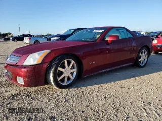 2007 Cadillac XLR z VIN 1G6YV36A775600889, wystawiony jako Copart lot #74500024 z przebiegiem Nie podano mil oraz Szkody całkowita. Historia ofert i sprzedaży dostępna na DreamBid. Obrazek 1.