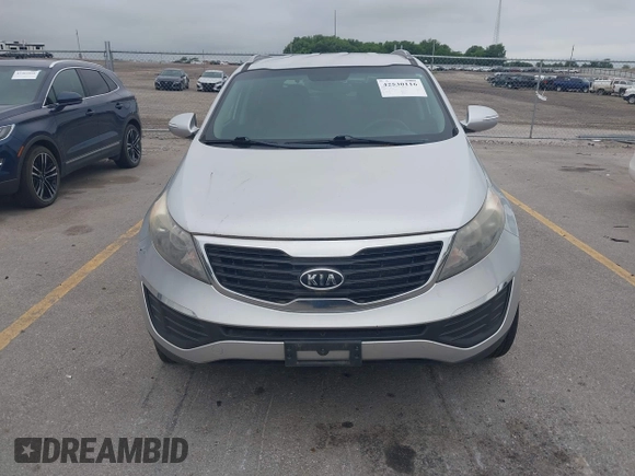 2012 Kia Sportage LX with VIN KNDPBCA24C7214432, listed as a IAAI auction lot 42530116 with 127,623 mi miles and . Bid and sale history available at DreamBid. Image 11.