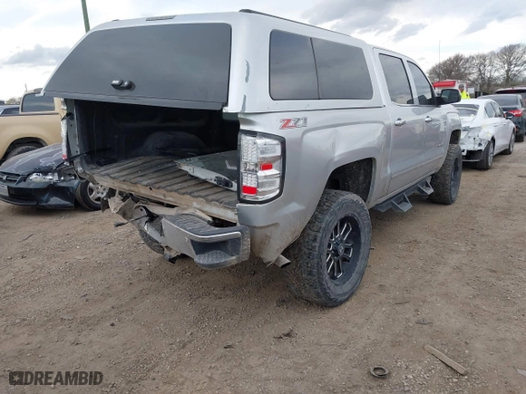 2015 Chevrolet Silverado 1500 LTZ with VIN 3GCUKSEC4FG134752, listed as a IAAI auction lot 41188074 with 154,939 mi miles. Bid and sale history available at carsss.com. Image 4.