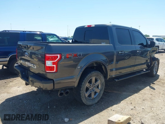 2020 Ford F-150 XL with VIN 1FTEW1E50LKE93170, listed as a IAAI auction lot 41918973 with 99,117 mi miles and . Bid and sale history available at carsss.com. Image 4.