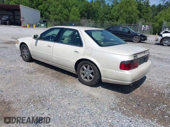 2000 Cadillac Seville Touring STS z VIN 1G6KY5495YU145937, wystawiony jako IAAI lot #42330143 z przebiegiem 217 894 mil mil oraz . Historia ofert i sprzedaży dostępna na DreamBid. Obrazek 3.