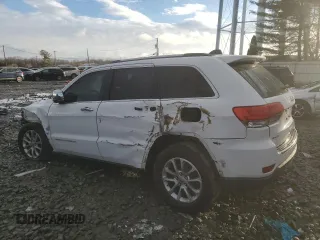 2014 Jeep Grand Cherokee Limited z VIN 1C4RJFBG8EC129868, wystawiony jako Copart lot #86781534 z przebiegiem 99 316 mil mil oraz Szkoda całkowita • Salvage title. Historia ofert i sprzedaży dostępna na DreamBid. Obrazek 2.