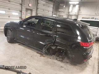 2018 Jeep Grand Cherokee Laredo E with VIN 1C4RJFAG4JC298393, listed as a IAAI auction lot 42073426 with 145,386 mi miles. Bid and sale history available at carsss.com. Image 3.