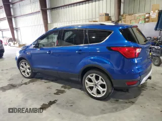 2019 Ford Escape Titanium с VIN 1FMCU0J91KUB47689, выставлен на аукционе Copart как лот 57995445 с пробегом 68 811 миль миль и Списание • Salvage title. История ставок и продаж доступна на DreamBid. Изображение 2.