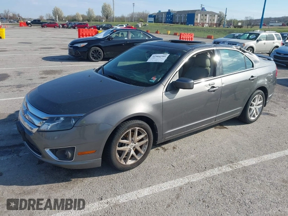 2011 Ford Fusion SEL with VIN 3FAHP0JG9BR267043, listed as a IAAI auction lot 41904289 with 168,580 mi miles. Bid and sale history available at carsss.com. Image 2.